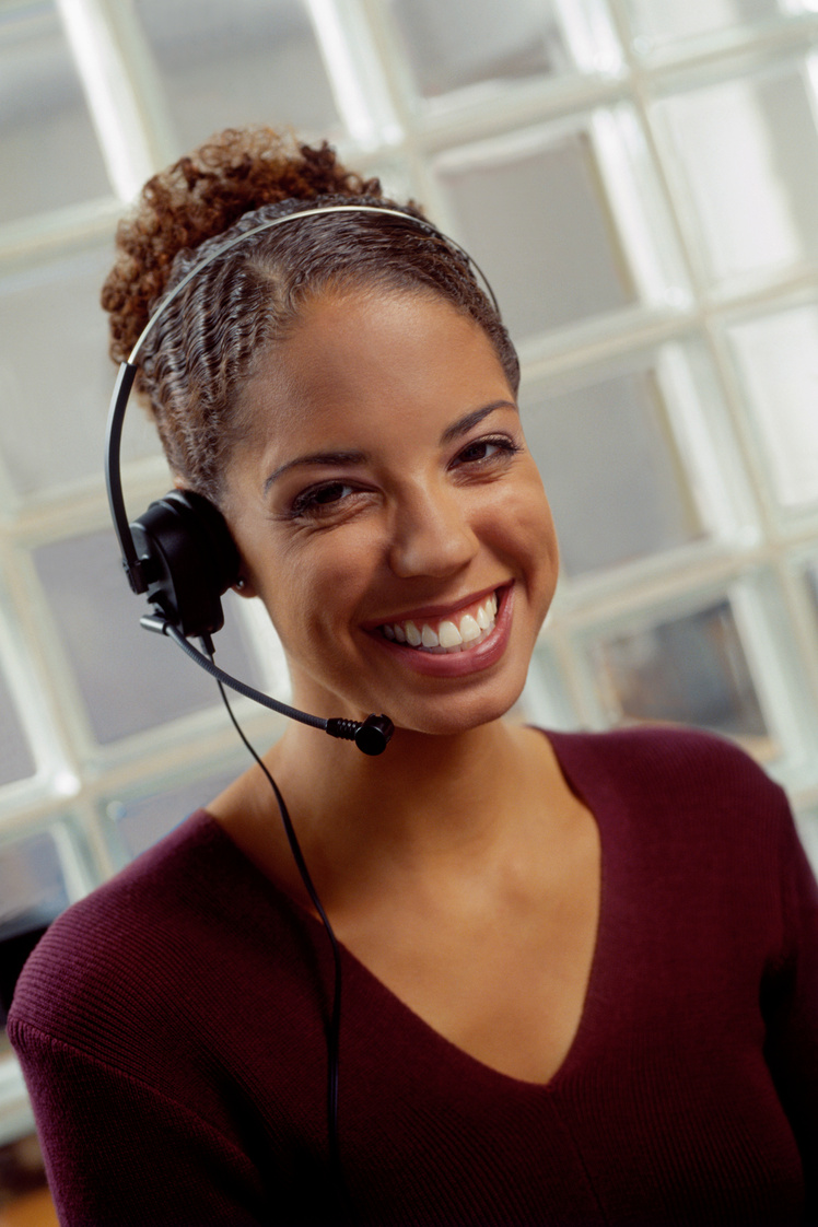 Portrait of woman wearing headset